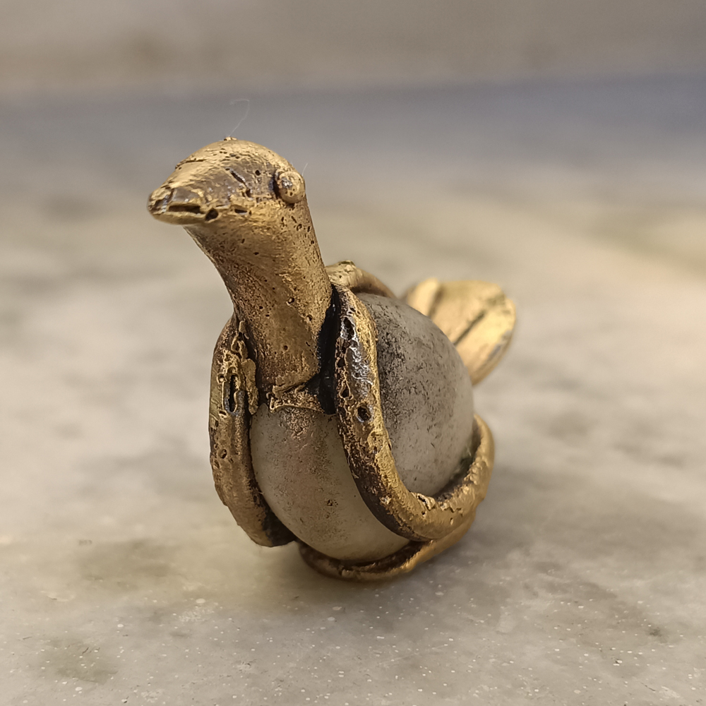 Handcrafted Dhokra Waterbird Figurine in Brass & River Stone